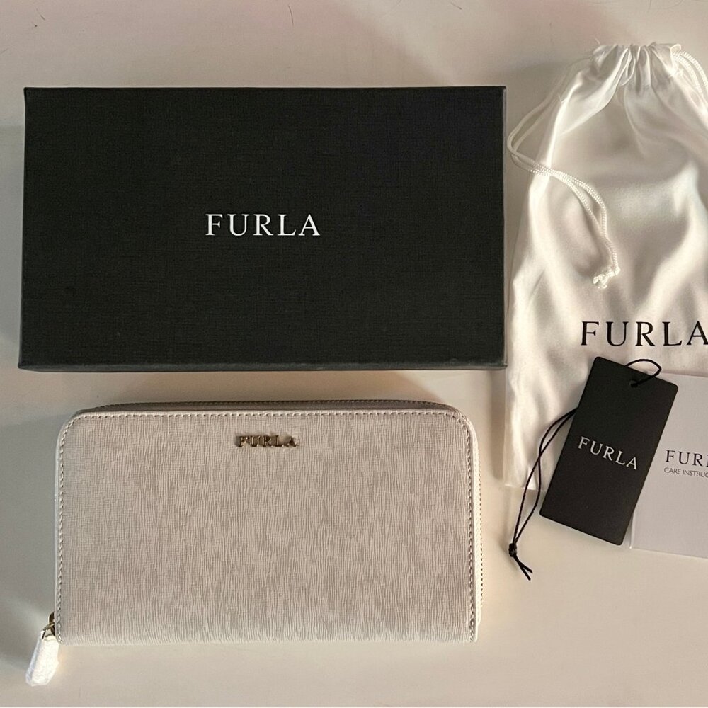 Furla extra large zip around leather wallet. Brand new with tags in box